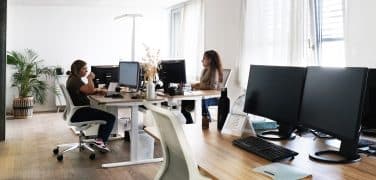 Equipe support de New Work à Granges-Paccot. Vue sur le bureau du Payroll